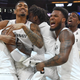The Cincinnati Bearcats celebrate their championship victory over the Houston Cougars in the 2018 AAC Basketball Championship on March 11, 2018, in Orlando, Fla.